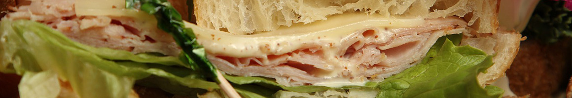 Eating Sandwich at Jefferson City Sub Shop restaurant in Jefferson City, MO.